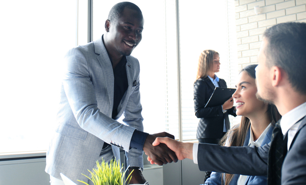 Two businessmen shaking hands.
